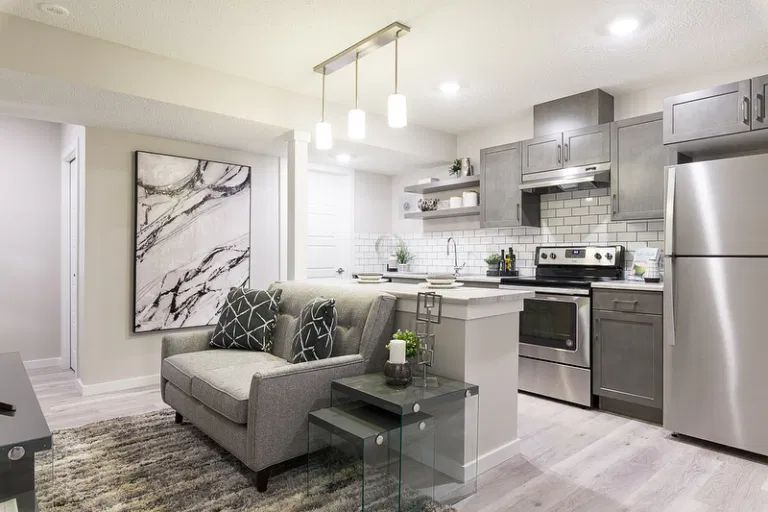 Modern legal basement suite in Calgary - open concept living and kitchen with contemporary finishes