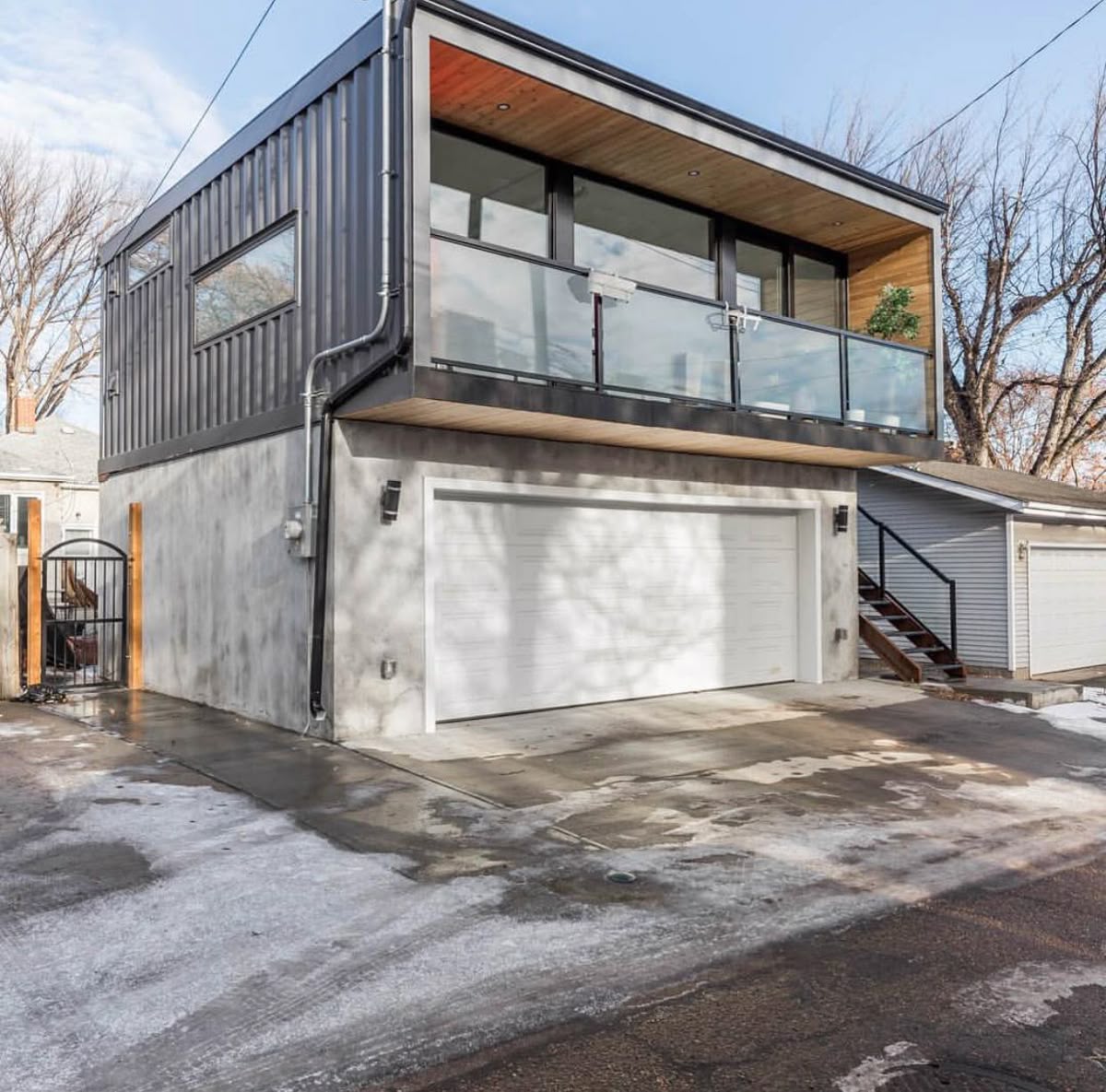 Modern garage suite with glass railing